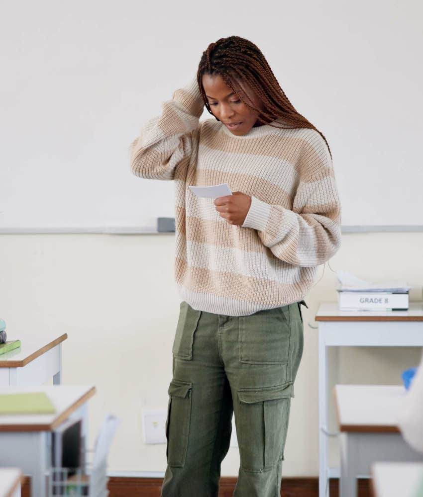 Nervous female student giving a presentation in class